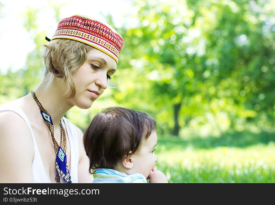 Mother with son relaxing at the park. Mother with son relaxing at the park