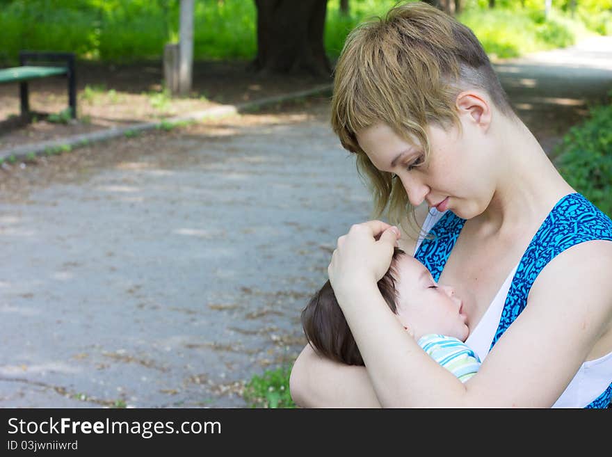 Mother with son relaxing at the park. Mother with son relaxing at the park