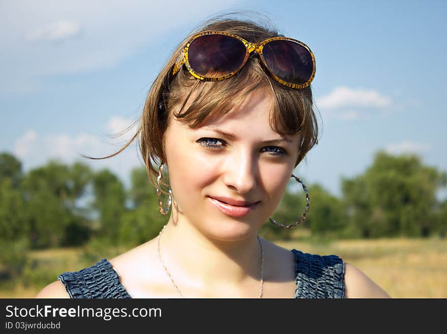 Portrait of a beautiful girl on nature. Portrait of a beautiful girl on nature