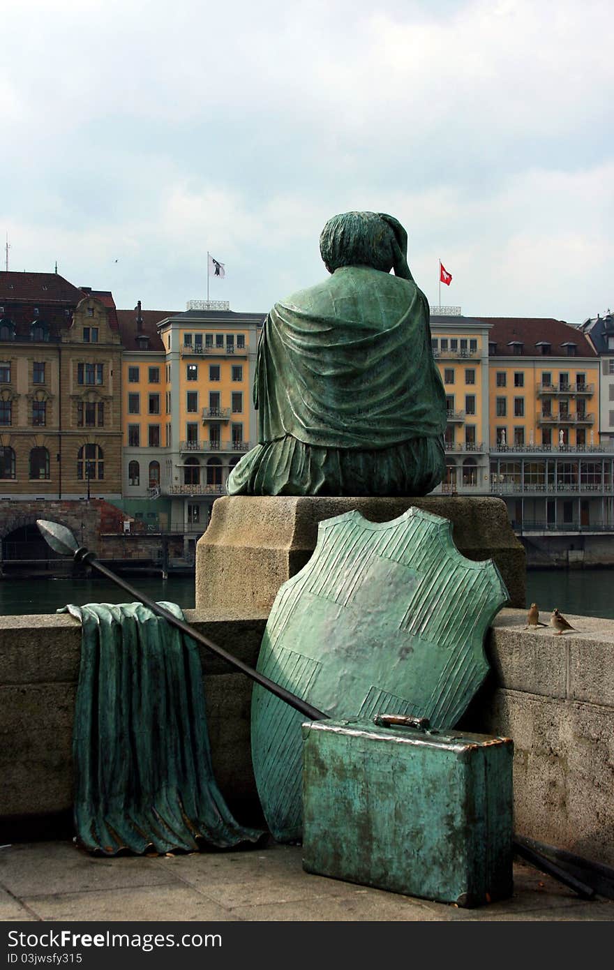 Helvetia in Basel (Mittlere Brücke). It is the female personification of Switzerland. Helvetia in Basel (Mittlere Brücke). It is the female personification of Switzerland.