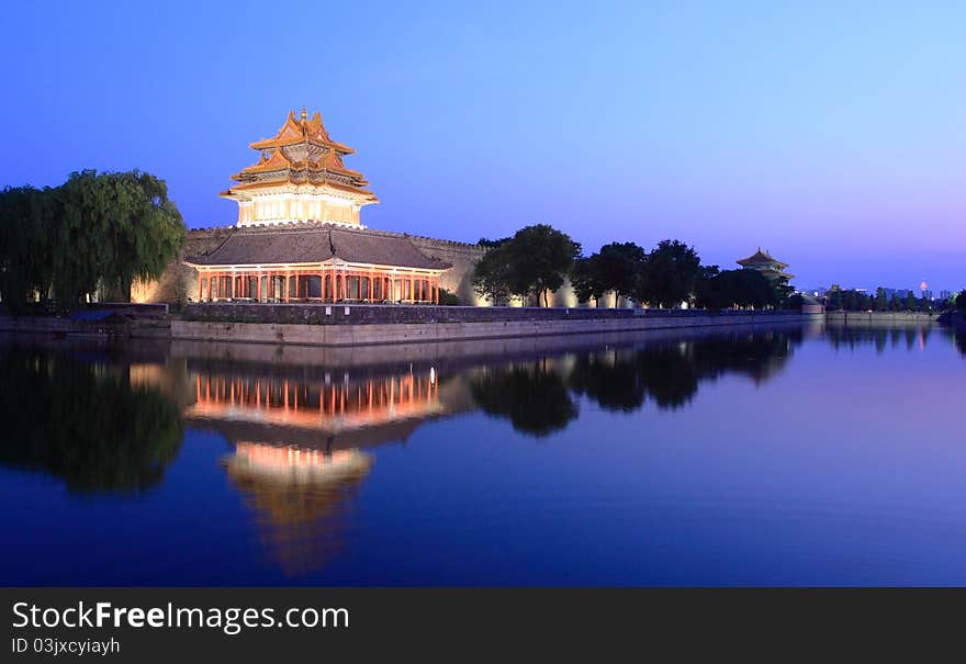 Night scene of Northeast corner of forbidden city,the reflection in the moat, Beijing China. Night scene of Northeast corner of forbidden city,the reflection in the moat, Beijing China.