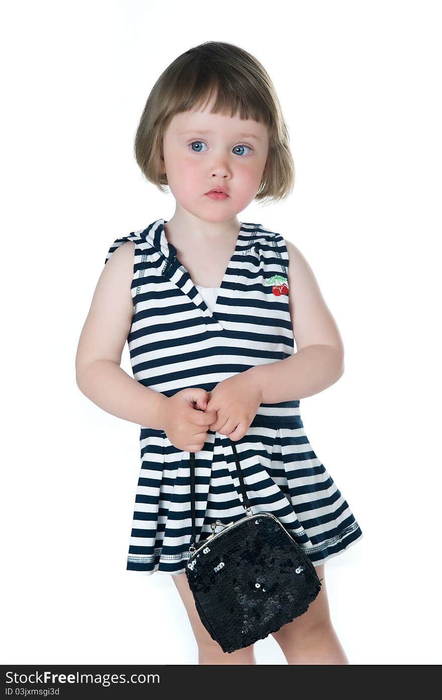 Cute little girl in studio on white background