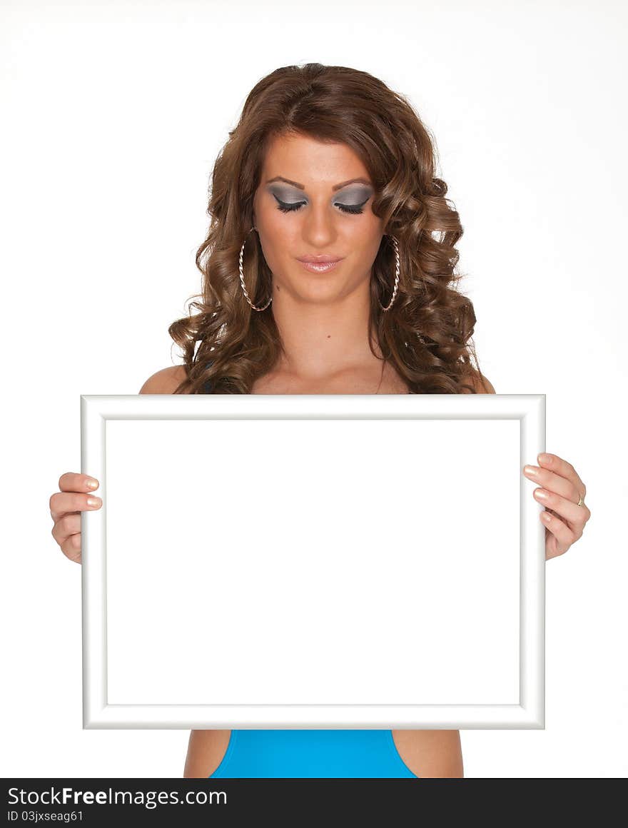 Beautiful woman holding a white sign. Beautiful woman holding a white sign