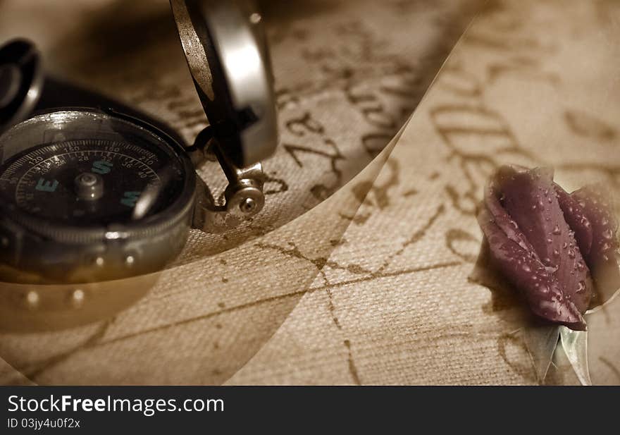 Travel back to ancient compass, map and a rosebud. Travel back to ancient compass, map and a rosebud