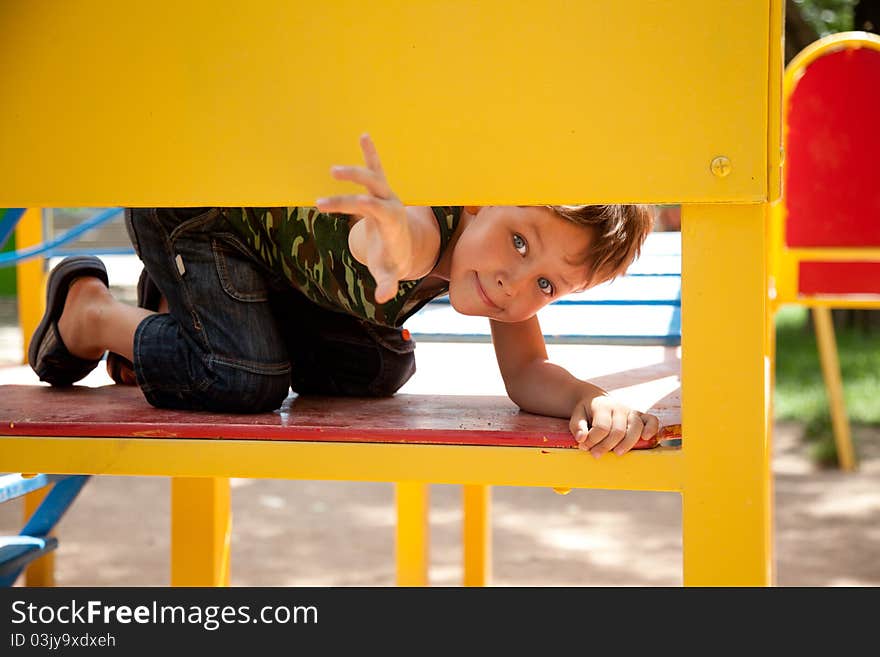 Cute young boy on playground