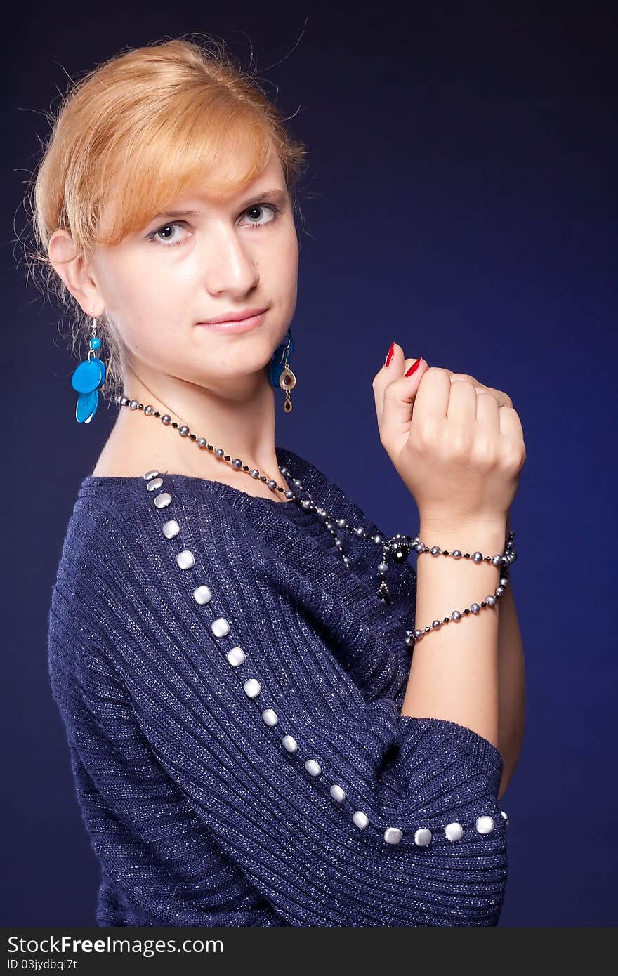 Red-haired Girl With Beads