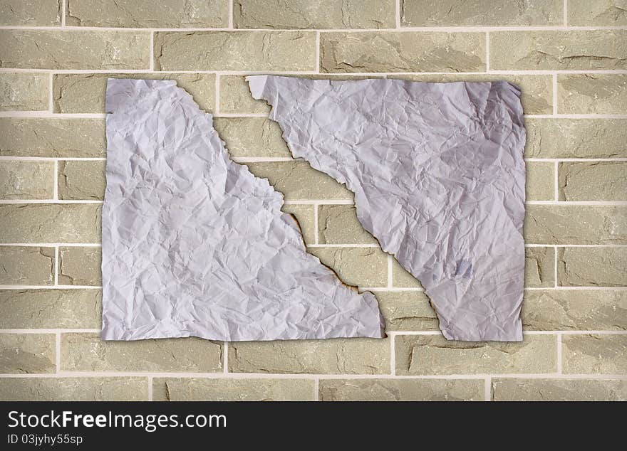 Burn crease paper on brick wall for background use