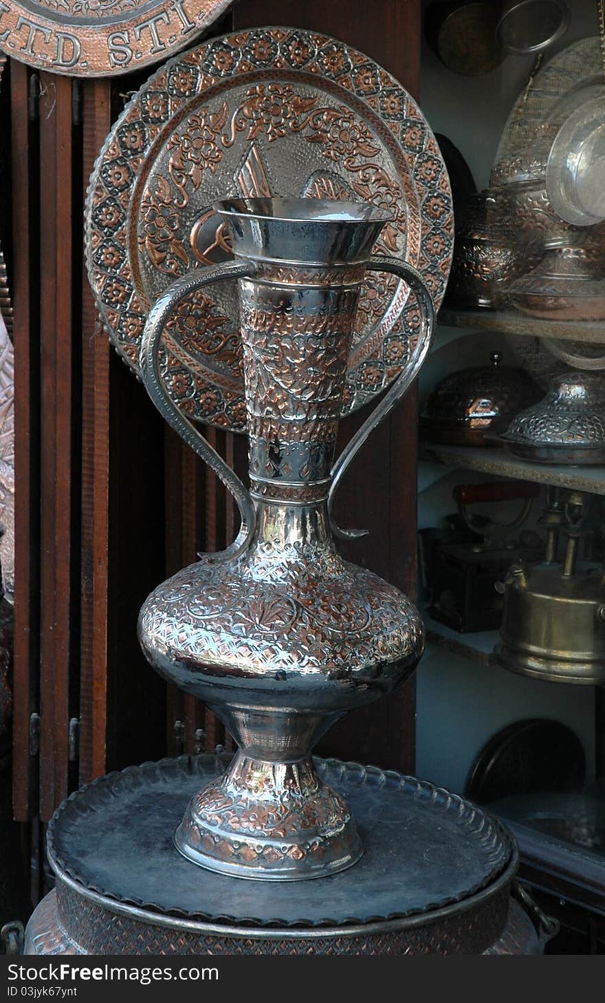 It's an ancient copper vase. It's a Anatolian decorative object.