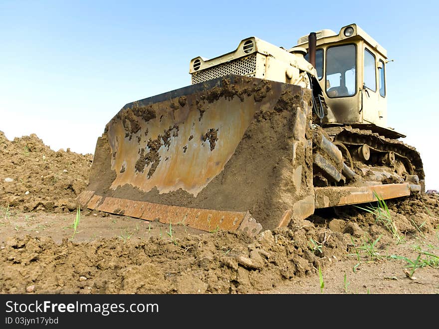 Digger, Heavy Duty construction equipment parked at work site