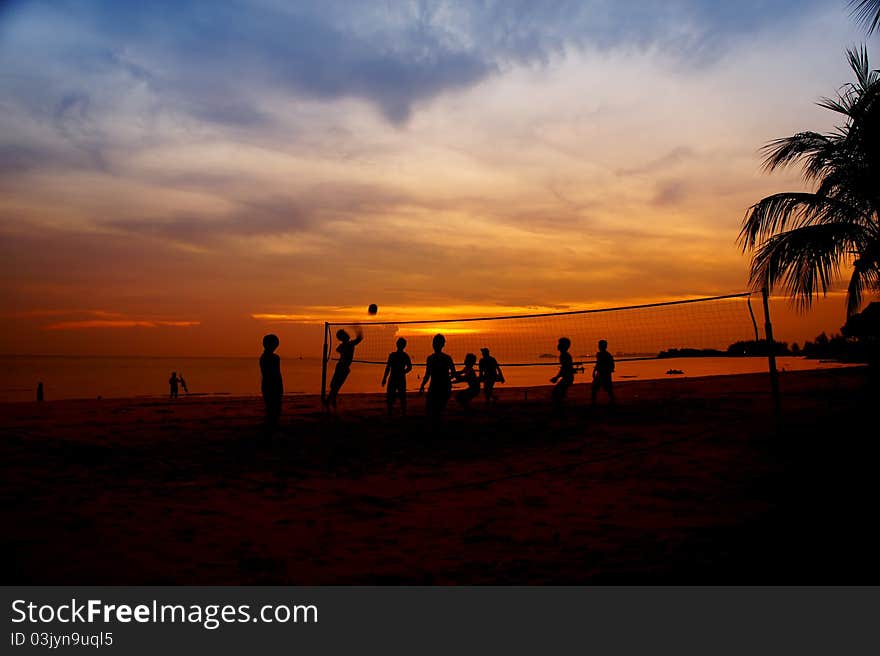 Volleyball game player at silhouette. Volleyball game player at silhouette