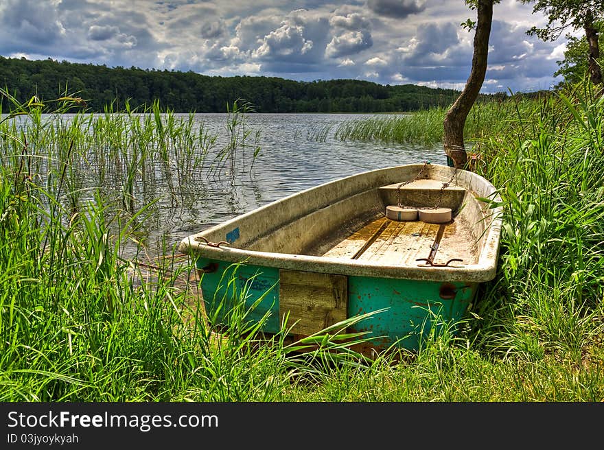 Landscape with a boat on a lake.