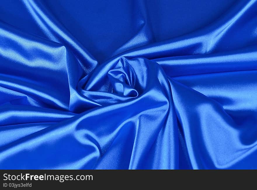 Blue satin textile background space for your text