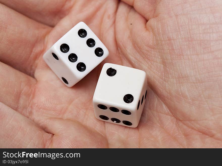 White dice with black dots