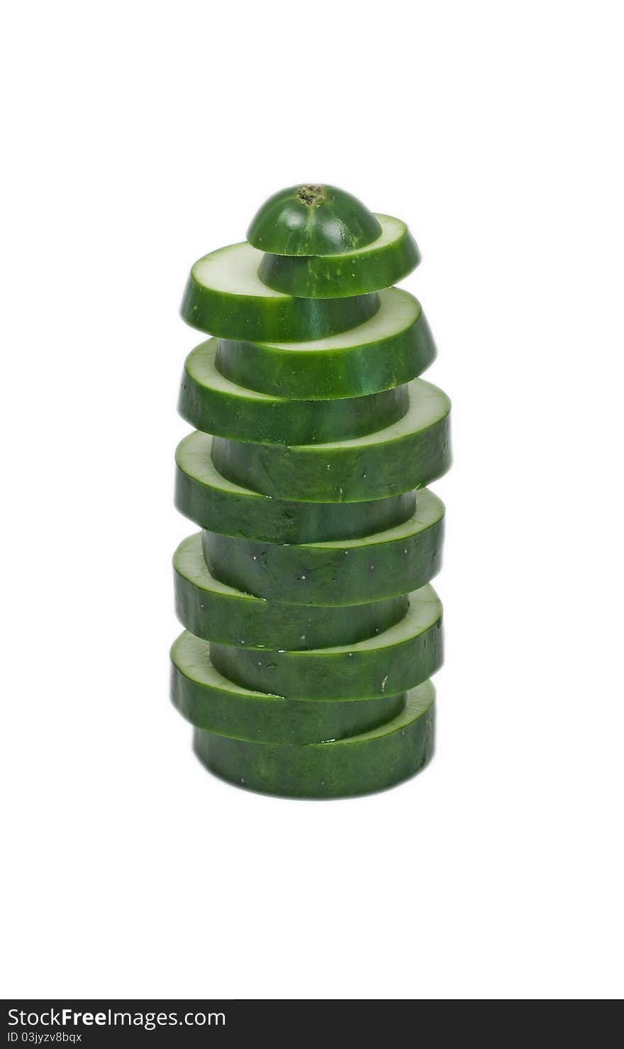 Sliced cucumber stacked vertical isolated white background