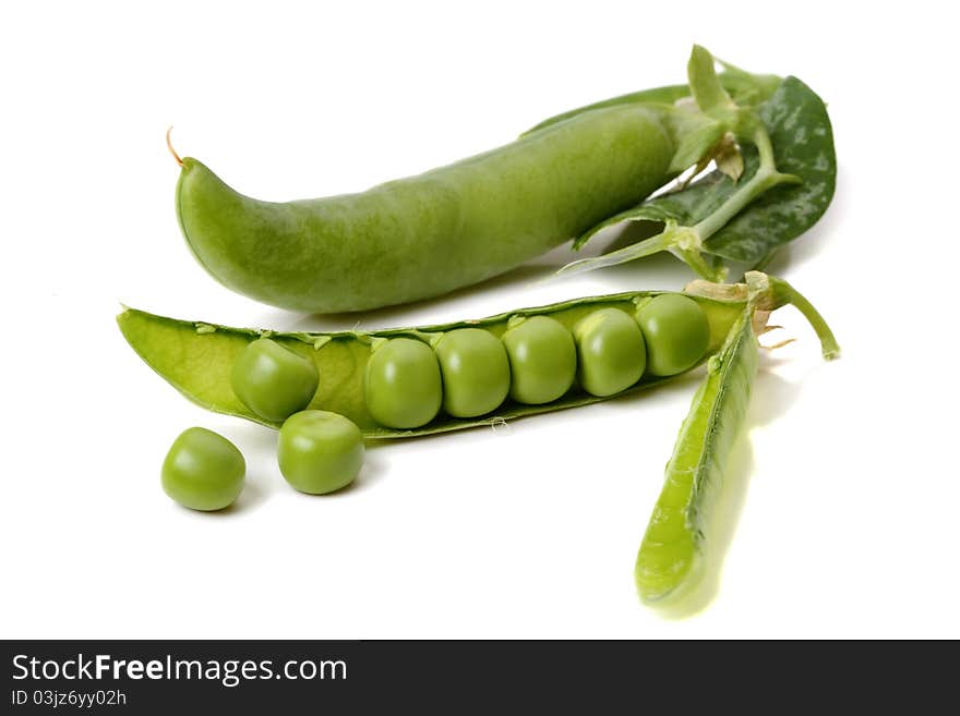 Green peas isolated on white background