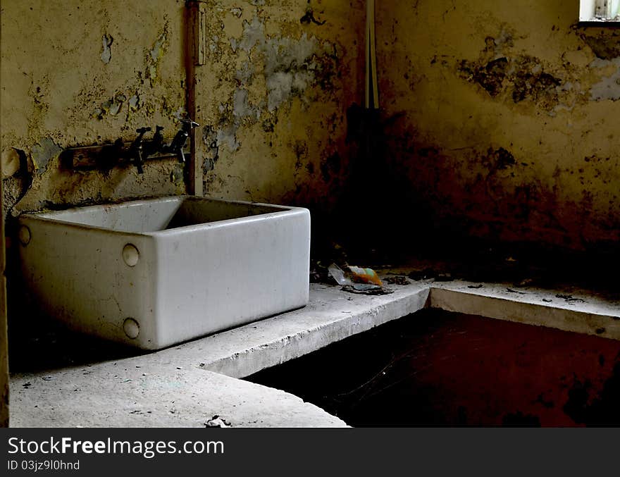 A photo of an old sink. A photo of an old sink