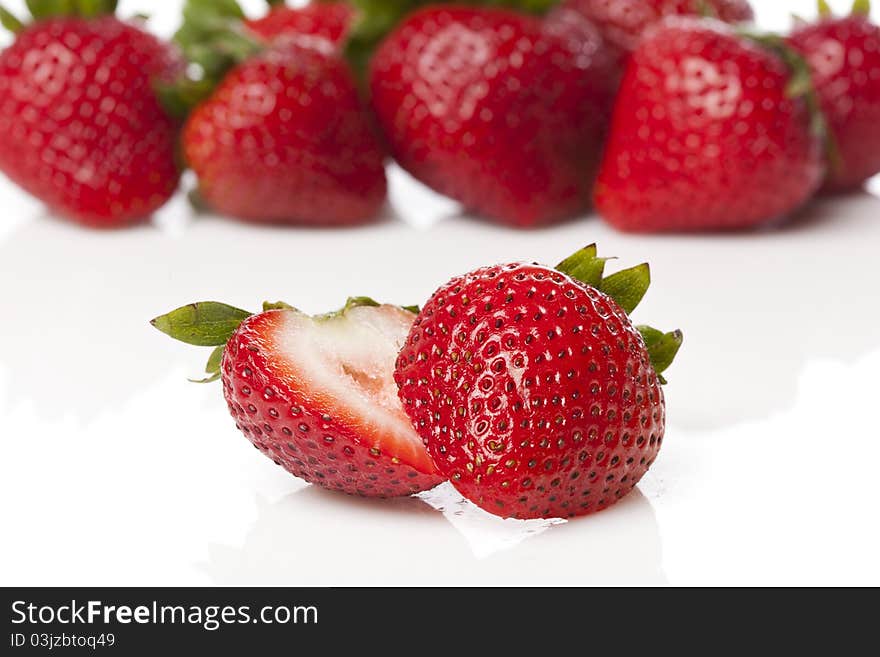 Fresh red strawberries against a white background