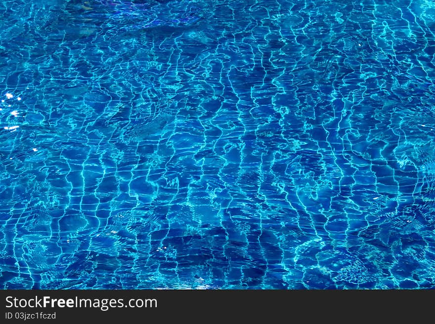 View of nice blue swimming pool water surface