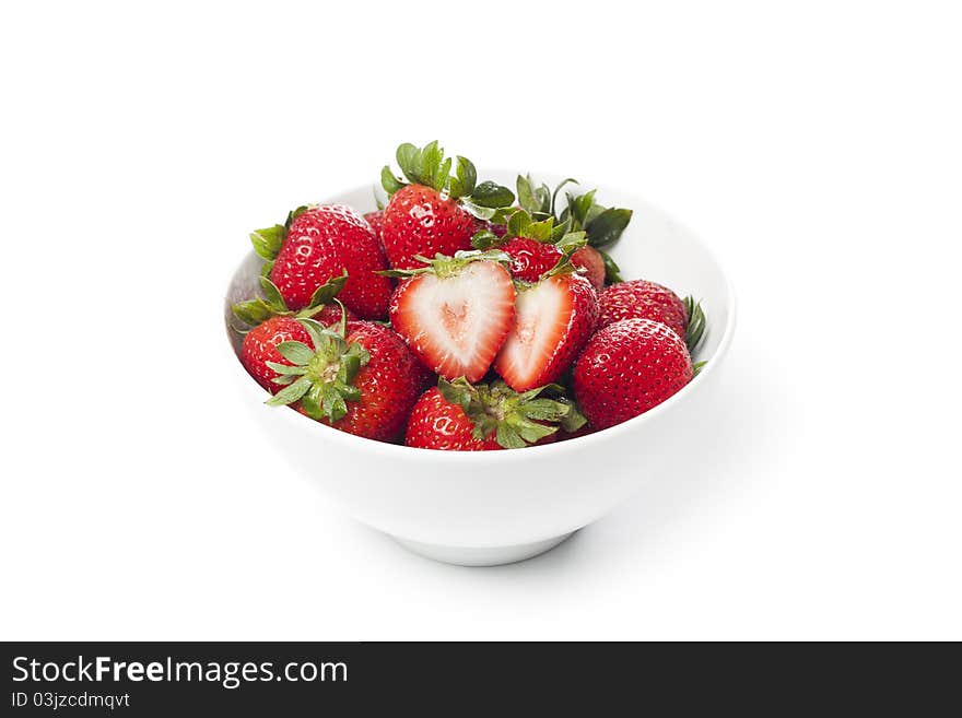 Fresh red strawberries against a white background