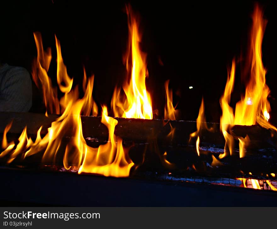 Night Fire On A Black Background.