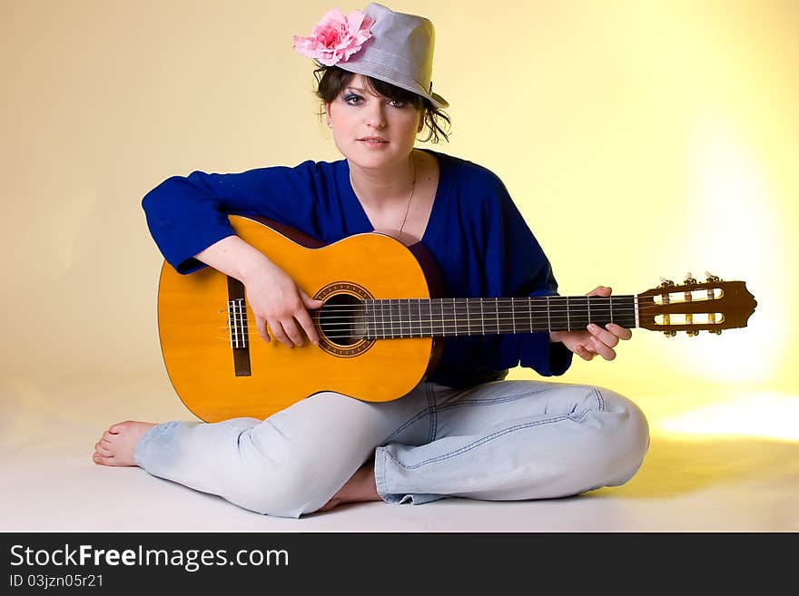 Romantic girl with the guitar