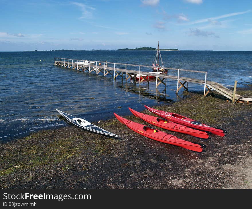 Sea Kayaks On The Beach