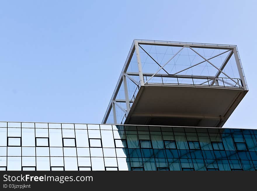 A modern terrace on a new office building with a decent overhang. A modern terrace on a new office building with a decent overhang