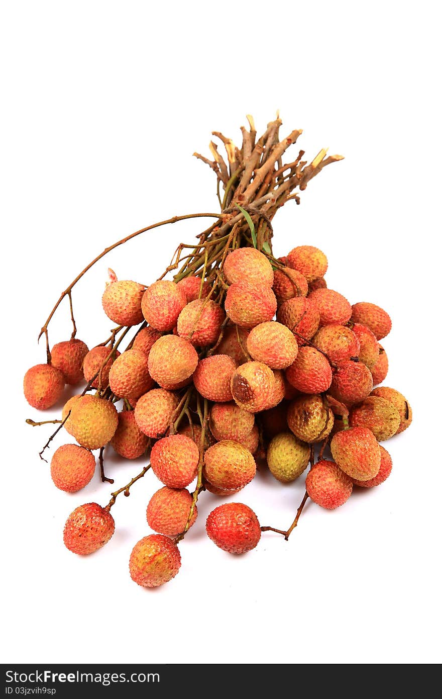 Litchi fruits in bunch over white background. Litchi fruits in bunch over white background.