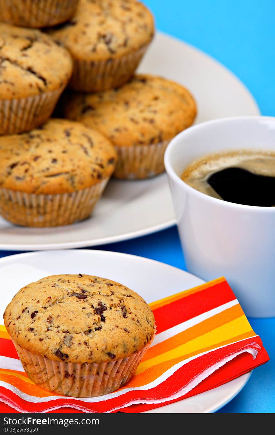 Chocolate chip muffins and cup of fresh coffee. Chocolate chip muffins and cup of fresh coffee