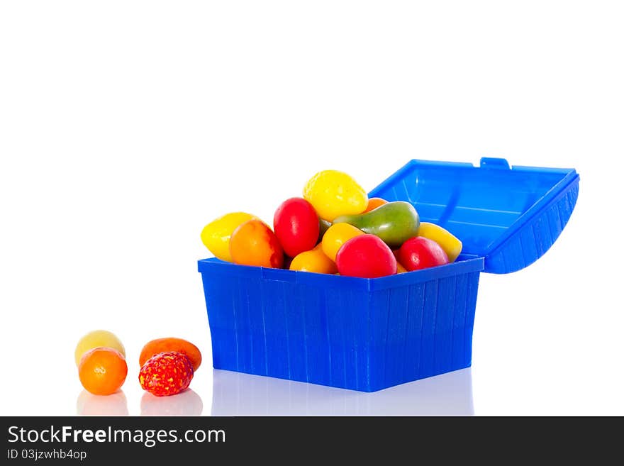 Old Dutch candy in an open plastic tray isolated over white background. Old Dutch candy in an open plastic tray isolated over white background