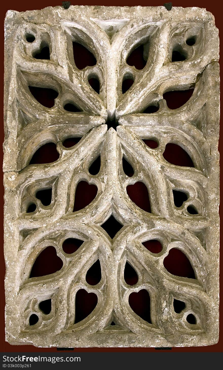 Close up photo of antique stone architectural ornament, detail of ancient building interior.