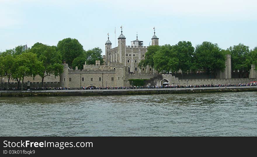 Tower of London seen from the Thames river in London, England. Tower of London seen from the Thames river in London, England