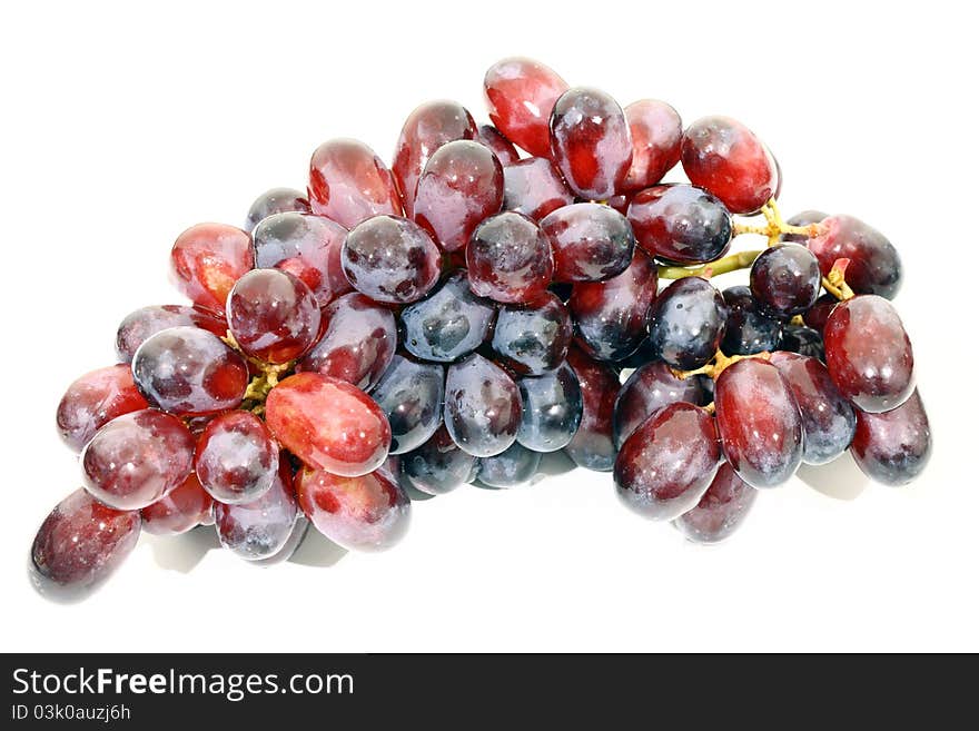 Red grape on a white background.