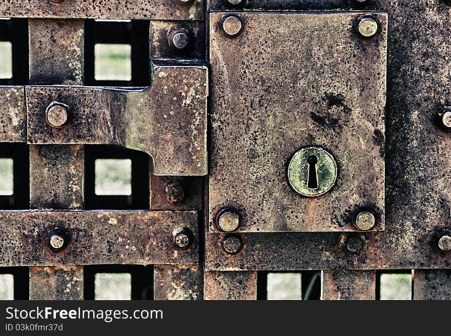 Close up of closed metal door with lock. HDR