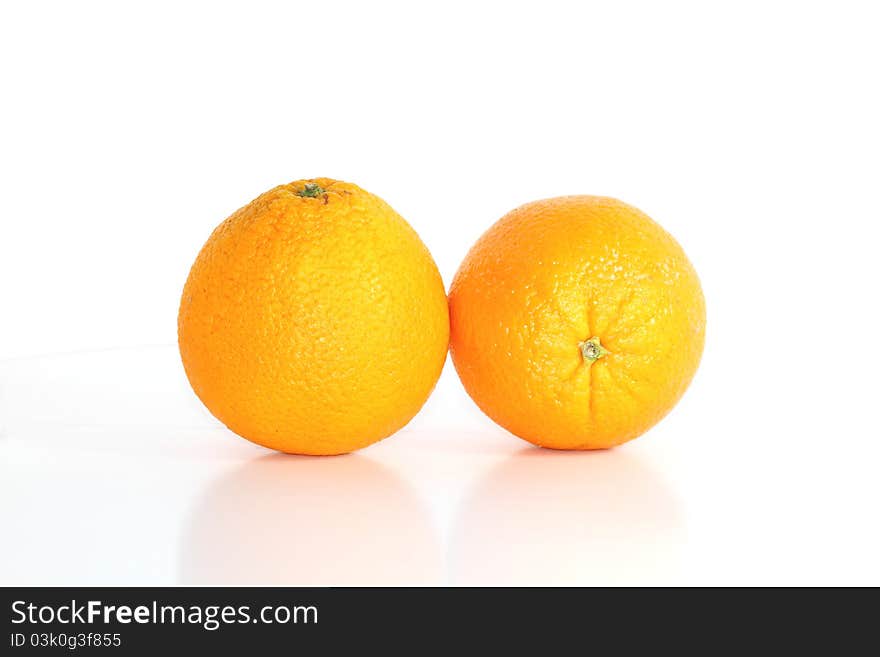 Two oranges isolated on white