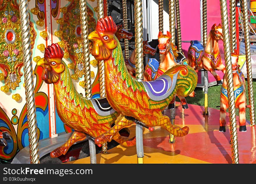 A Fun Fair Carousel Ride with Chickens and Horses. A Fun Fair Carousel Ride with Chickens and Horses.