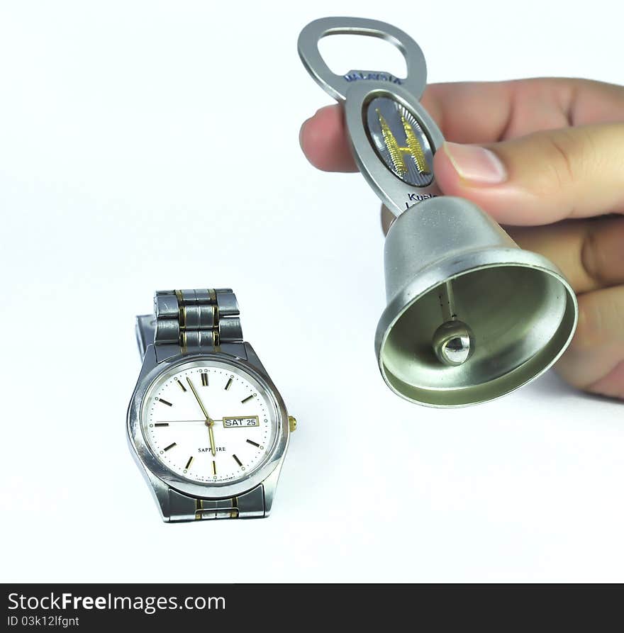 Chrome and black wrist watch, casting reflection on white. Chrome and black wrist watch, casting reflection on white.