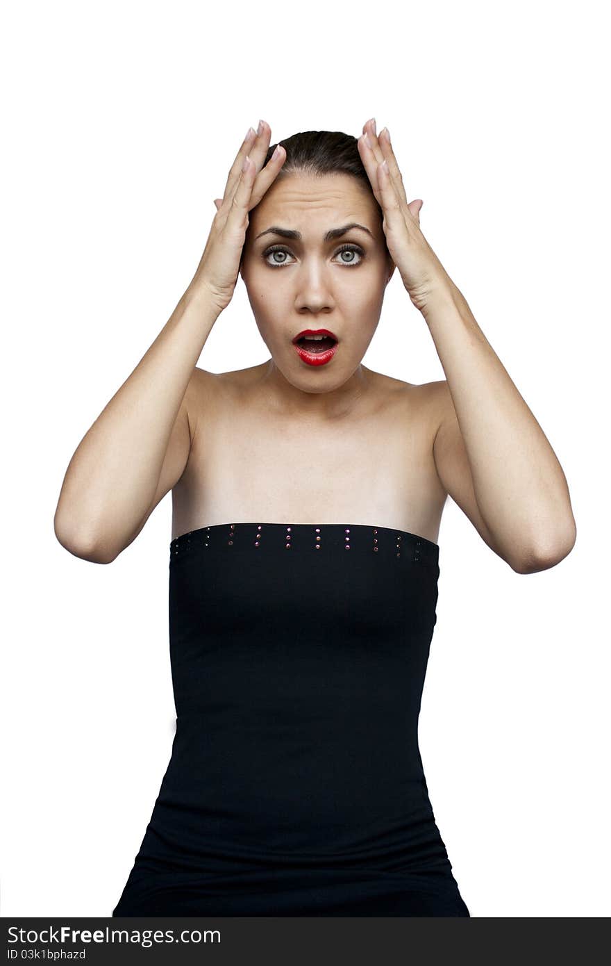 Shocked sad woman holds head with hands, isolated on white. Shocked sad woman holds head with hands, isolated on white