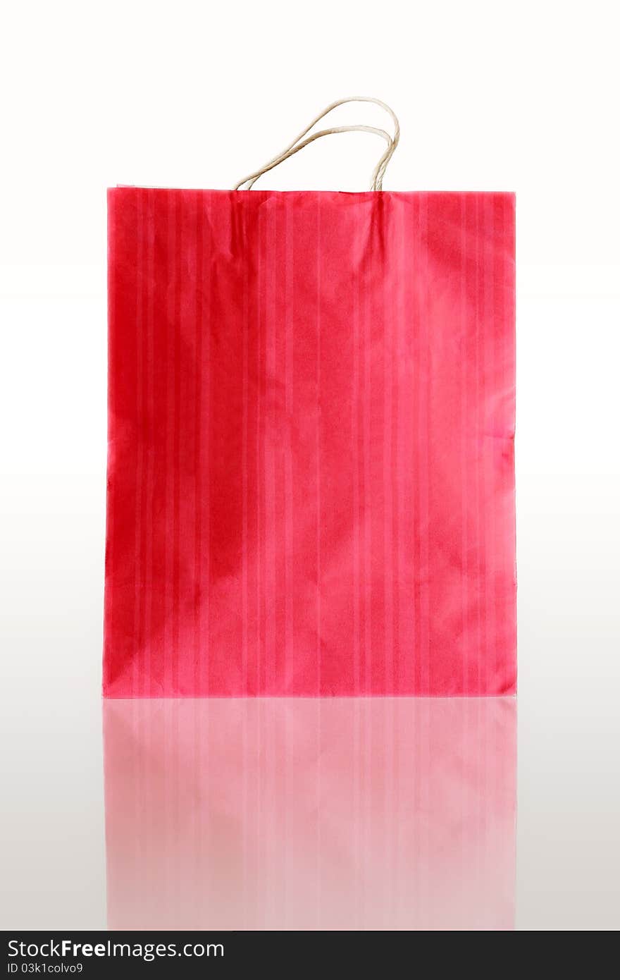 Red paper bags on reflect floor