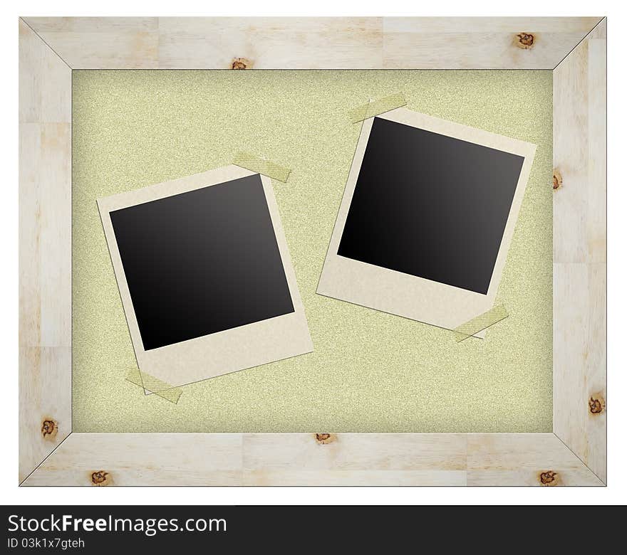 Blank photo frames on cork board isolated