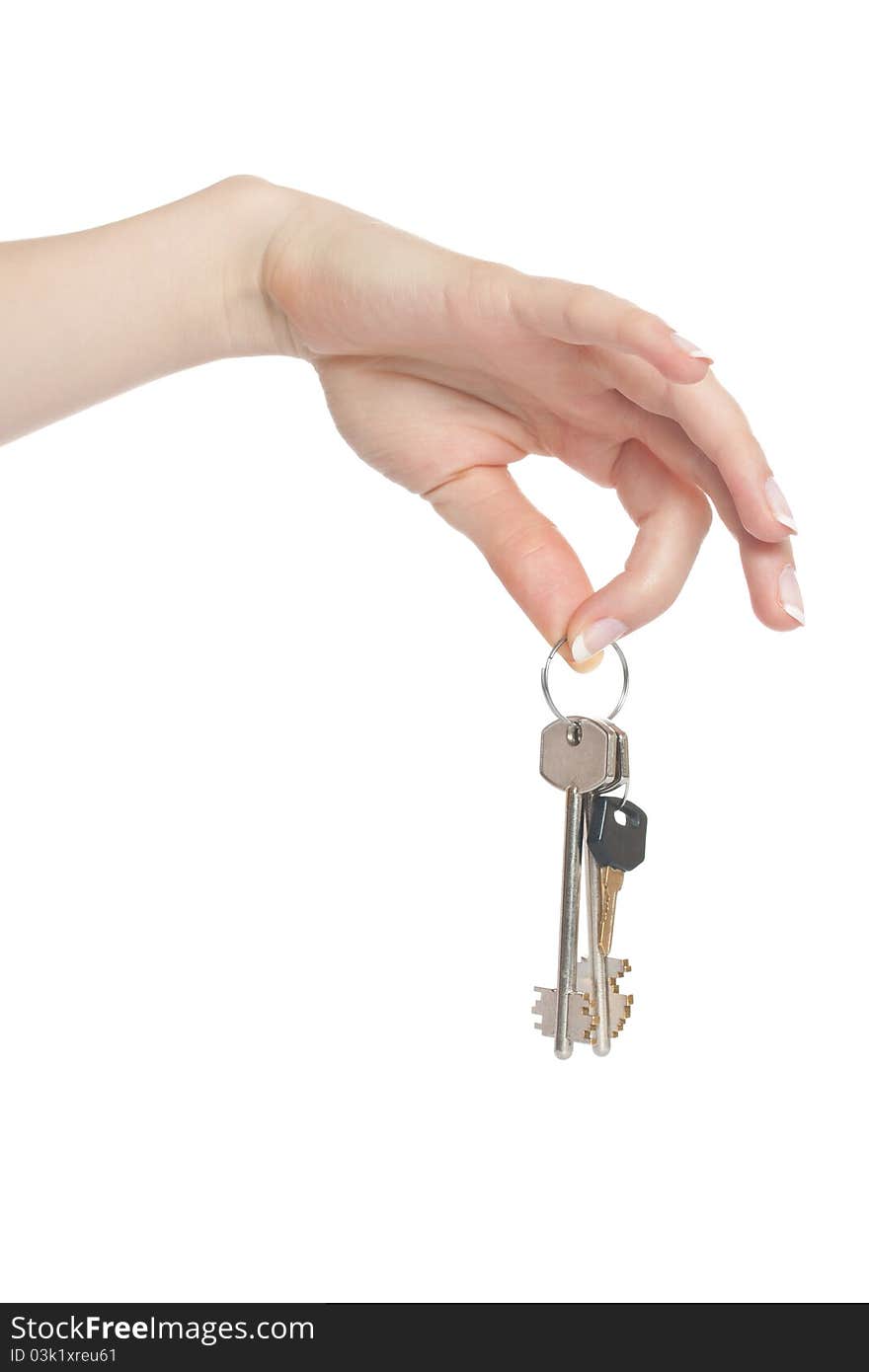 Woman hand holding bunch of keys isolated on white background. Woman hand holding bunch of keys isolated on white background