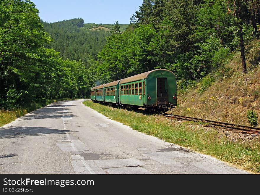 Train and road in bulgaria in pirin national park. Train and road in bulgaria in pirin national park