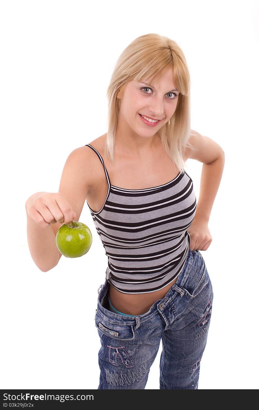 Young healthy woman holds green apple isolated. Young healthy woman holds green apple isolated