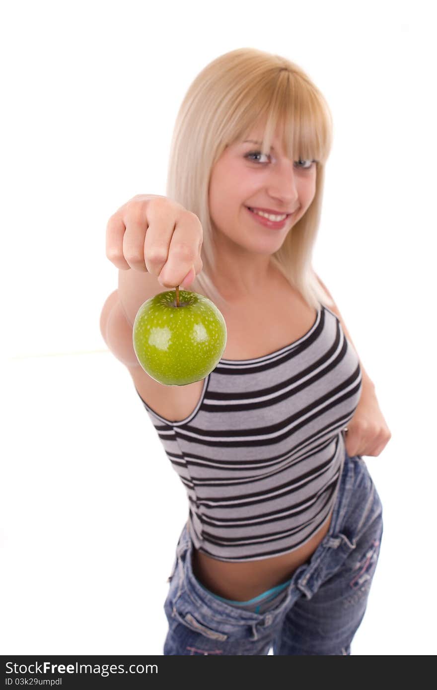 Woman holds green apple isolated on white background