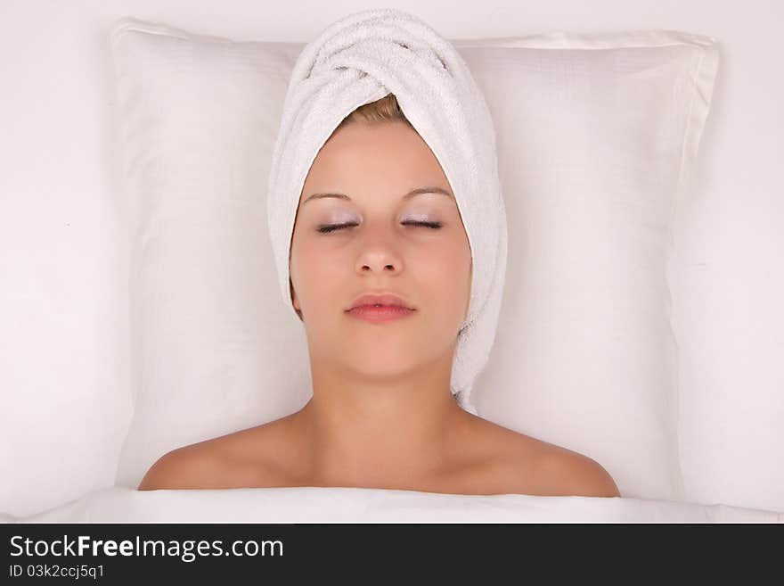 Young woman relaxing in spa