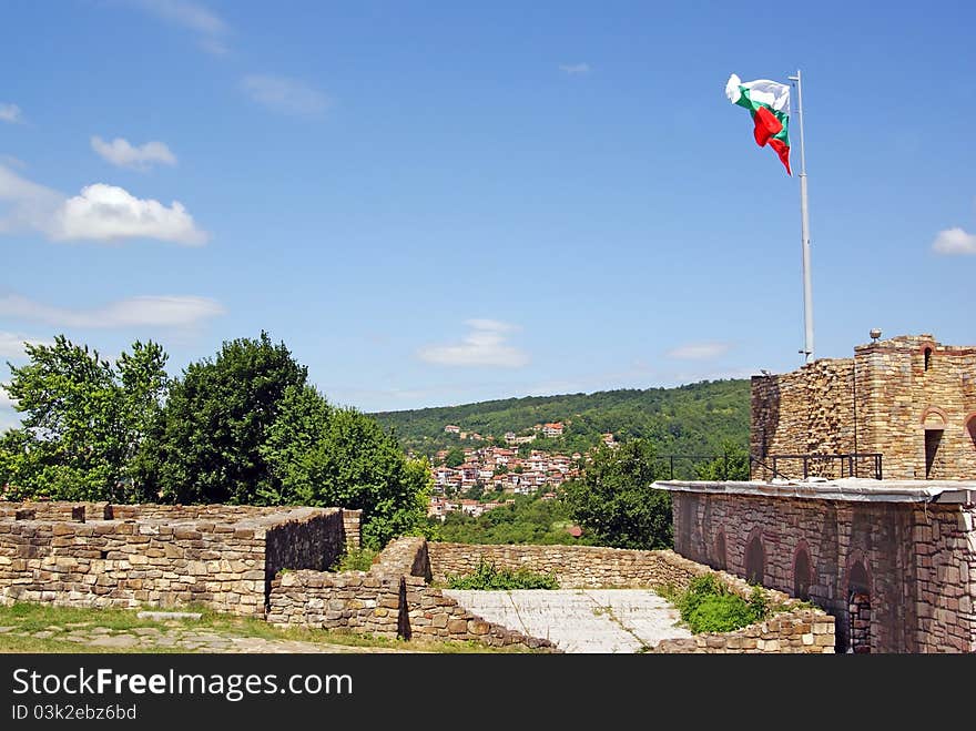 Bulgaria flag on Trapezista citadel near Veliko Turnovo - the former capital of Bulgaria. Bulgaria flag on Trapezista citadel near Veliko Turnovo - the former capital of Bulgaria