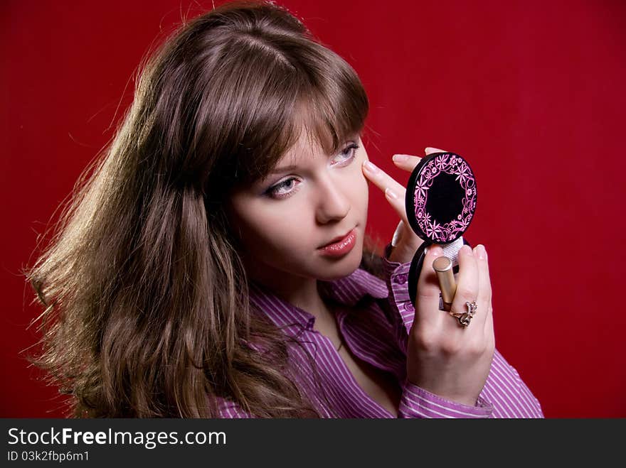 Close Up Of Woman Looking Into Mirror