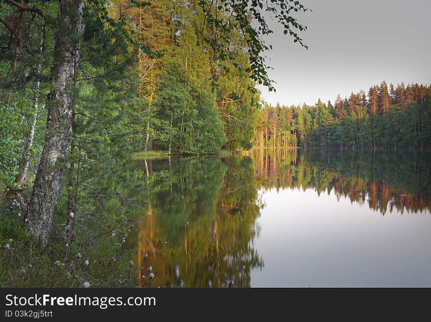 Finland: Summer evening by a calm lake