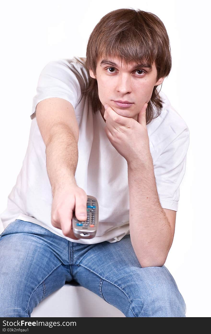 The person with a control panel the TV on a white background. The person with a control panel the TV on a white background