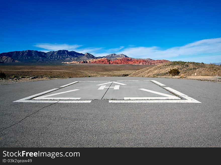 Helicopter pad with a view of the Mojave Desert.